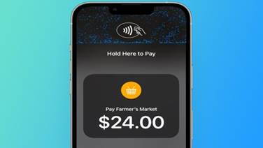 A phone with a screen showing a payment

Description automatically generated
